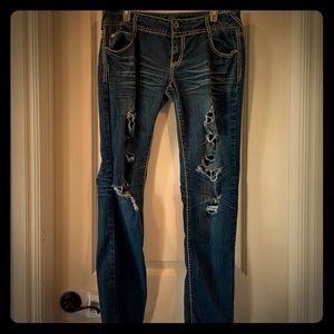 Premiere distressed skinny jeans